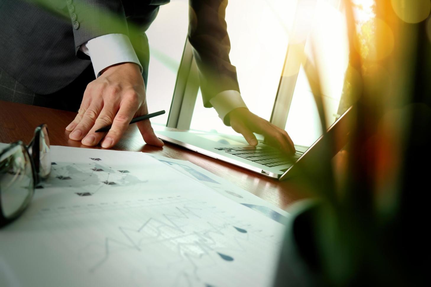Professional consulting session showing collaborative problem-solving and strategic planning